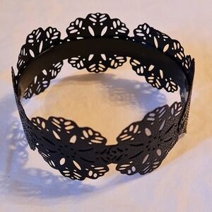 Unique black metal like bracelet in good condition.